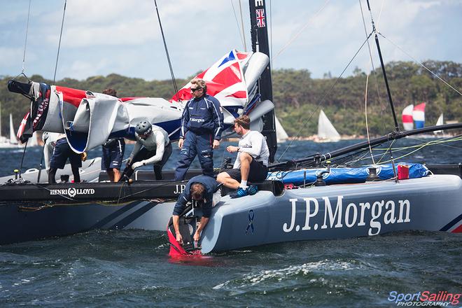 JP Morgan BAR Fixing rudder SSP - Day 3, Extreme Sailing Series, Sydney © Beth Morley - Sport Sailing Photography http://www.sportsailingphotography.com